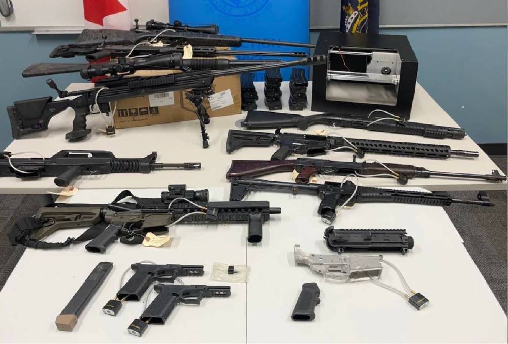 Guns, parts and a 3D printer were seized by CBSA officers. (Canada Border Services Agency handout)