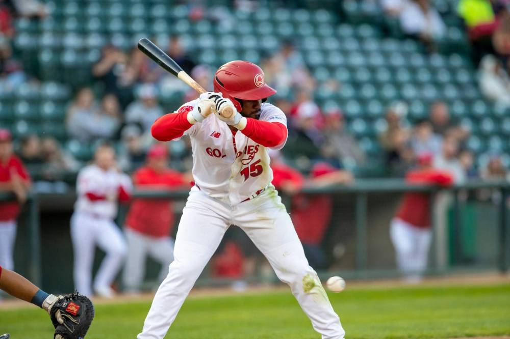 BROOK JONES / FREE PRESS
Goldeyes second baseman Keshawn Lynch takes a pitch at the knees.