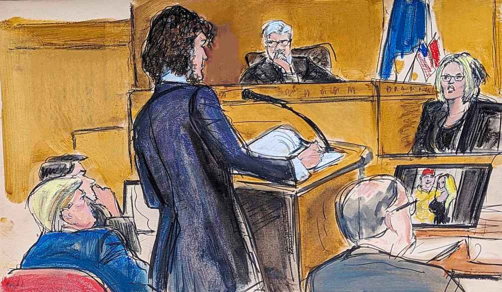 Judge Juan Merchan presides over proceedings as Stormy Daniels, far right, answers questions on direct examination by assistant district attorney Susan Hoffinger in Manhattan criminal court as former President Donald Trump and defense attorney Todd Blanche look on, Tuesday, May 7, 2024, in New York. (Elizabeth Williams via AP)