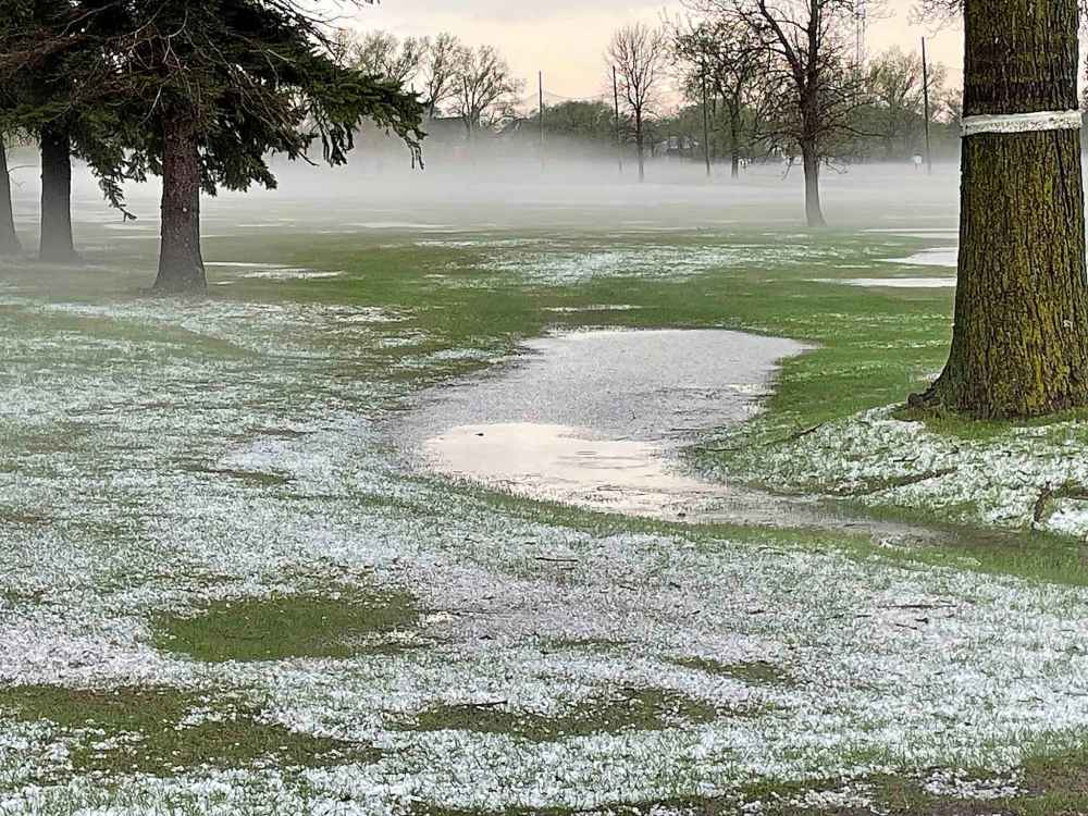 Hail on the Tuxedo golf course off Shaftesbury Boulevard. (Ruth Bonneville / Free Press)