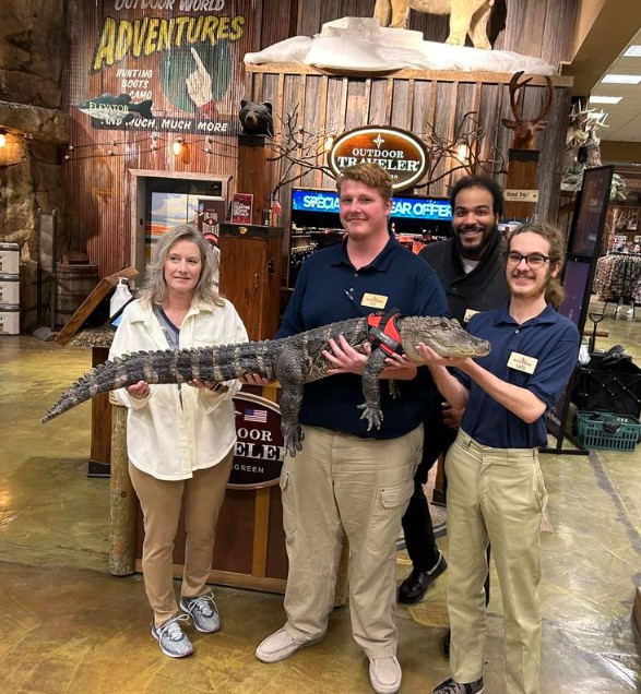 Joie Henney has thousands of social media users following his pages devoted to Wally, the cold-blooded companion that he calls his emotional support alligator.  (Photo: @wallygatornjoie on Instagram)