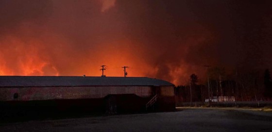 Cranberry Portage was evacuated Saturday night, as a wildlife spread close to the northern community. (Heather Charlette / Facebook)