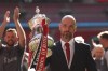 Manchester United's head coach Erik ten Hag celebrates with the trophy after winning the English FA Cup final soccer match between Manchester City and Manchester United at Wembley Stadium in London, Saturday, May 25, 2024. (AP Photo/Ian Walton)