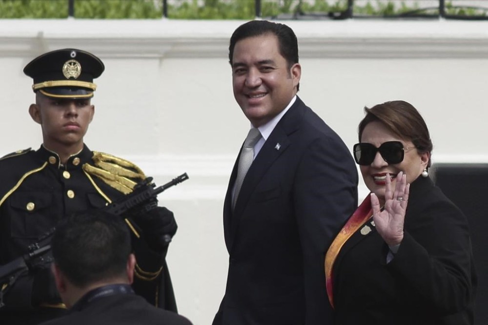 President of Honduras Xiomara Castro waves as she arrives to attend President Nayib Bukele's inauguration ceremony, in San Salvador, El Salvador, Saturday, June 1, 2024. (AP Photo/Salvador Melendez)