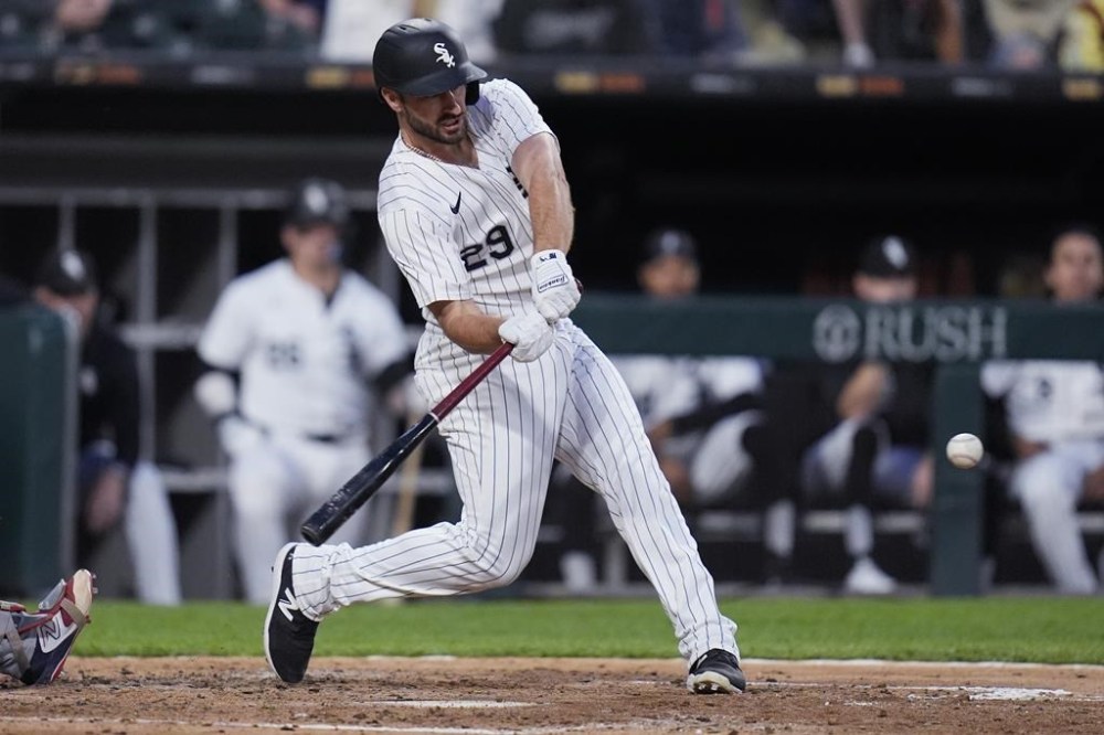 Chicago White Sox's Paul DeJong hits a single against the Boston Red Sox during the fourth inning of a baseball game Friday, June 7, 2024, in Chicago. (AP Photo/Erin Hooley)