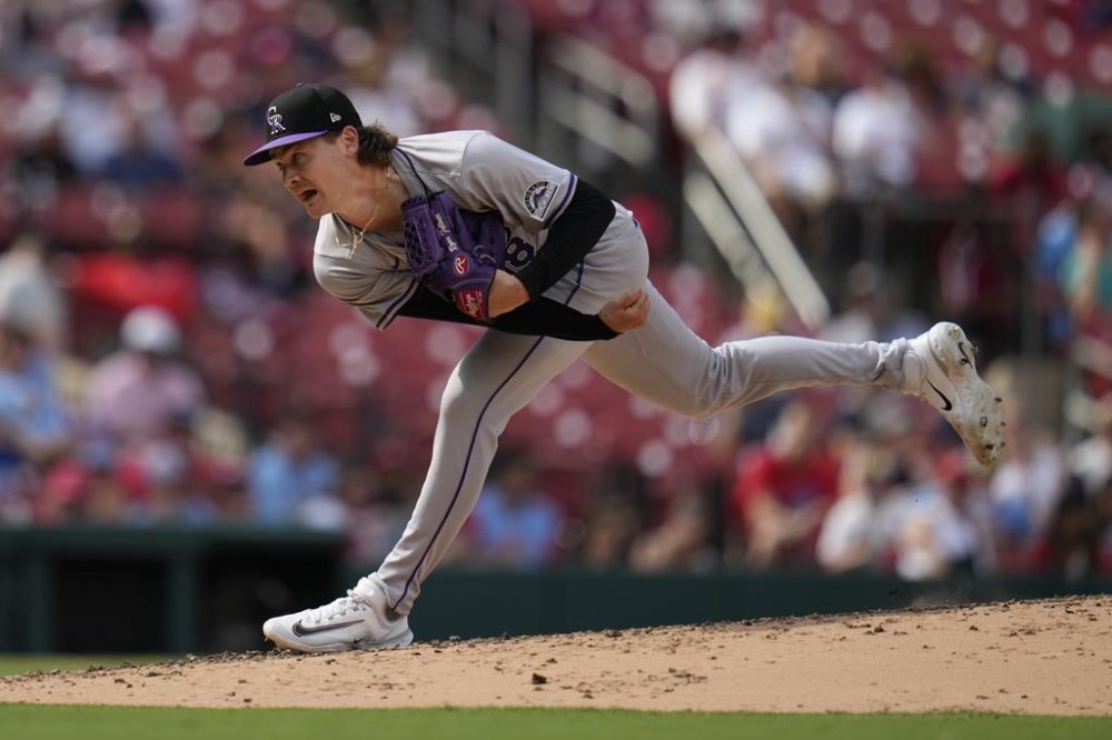 Colorado Rockies starting pitcher Ryan Feltner throws during the fifth inning of a baseball game against the St. Louis Cardinals Saturday, June 8, 2024, in St. Louis. (AP Photo/Jeff Roberson)