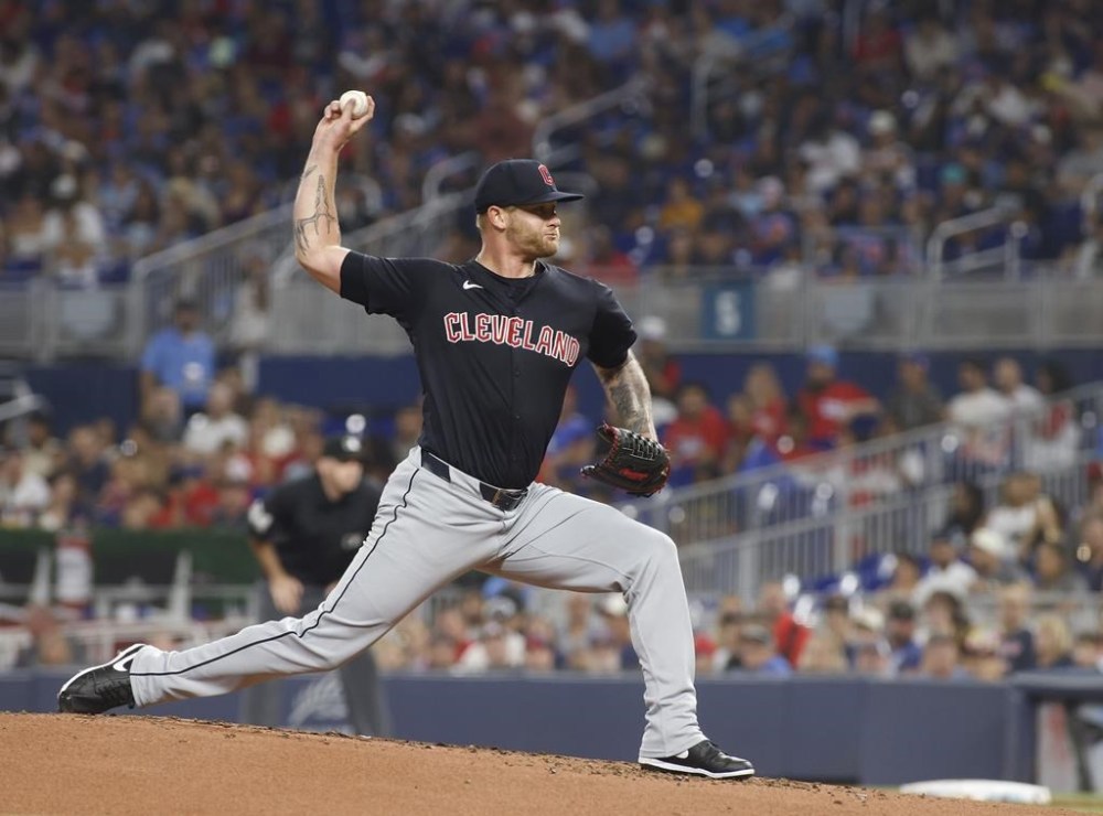 Cleveland Guardians pitcher Ben Lively throws to a Miami Marlins batter during the first inning of a baseball game Saturday, June 8, 2024, in Miami. (AP Photo/Thom Baur)