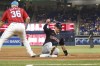 Cleveland Guardians' David Fry, front right, slides into third base during a baseball game against the Miami Marlins, Saturday, June 8, 2024, in Miami. (AP Photo/Thom Baur)