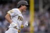 San Diego Padres' Ha-Seong Kim celebrates after hitting a three-run home run during the second inning of a baseball game against the Arizona Diamondbacks, Saturday, June 8, 2024, in San Diego. (AP Photo/Gregory Bull)