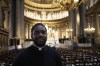 Jason Nioka, a former judo champion and deacon who's in charge of the largest contingent of Olympic chaplains, about 40 priests, nuns and lay Catholics, poses inside the Madeleine church, Thursday, May 30, 2024 in Paris. As athletes rev up their training and organizers finalize everything from ceremonies to podiums before the Paris Olympics, more than 120 faith leaders are preparing for a different challenge – spiritually supporting some 14,000 participants from around the world, especially those whose medal dreams will inevitably get crushed. (AP Photo/Michel Euler)