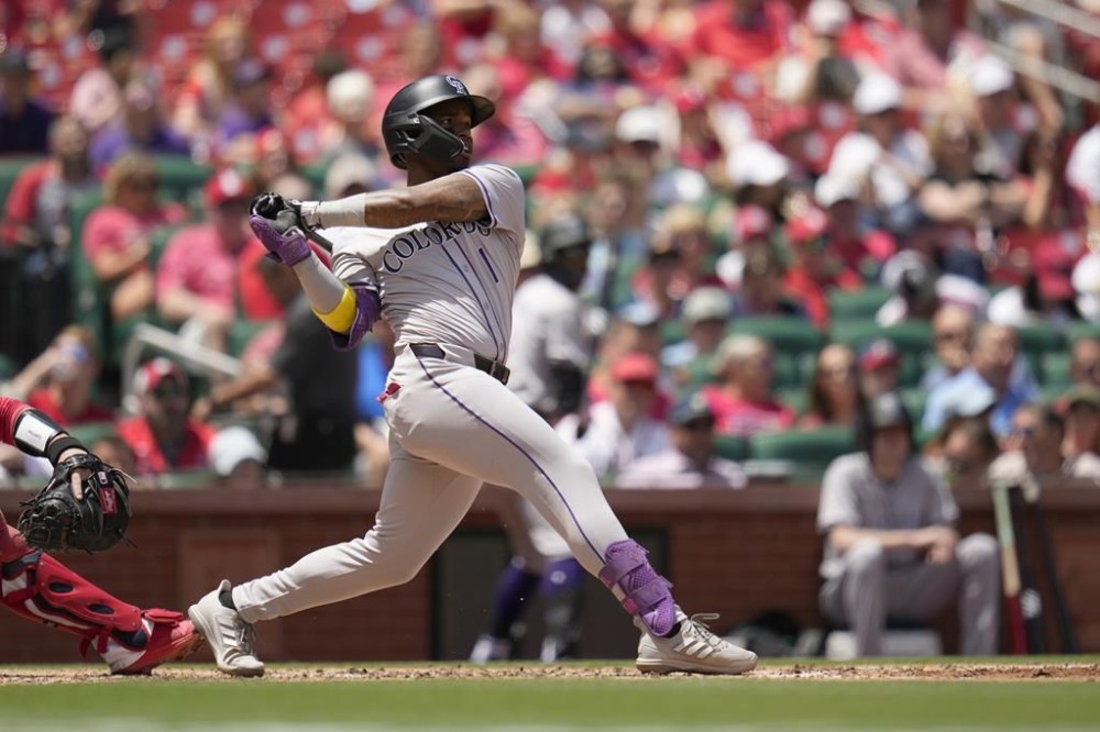 Colorado Rockies' Adael Amador singles during the third inning of a baseball game against the St. Louis Cardinals Sunday, June 9, 2024, in St. Louis. (AP Photo/Jeff Roberson)