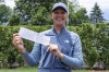 Linnea Strom, of Sweden, holds up her record setting scorecard during the final round of the LPGA Classic golf tournament, Sunday, June 9, 2024, in Galloway, N.J. Strom sets a tournament record with 11 under par. (AP Photo/Chris Szagola)