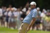 Scottie Scheffler reacts after missing a putt on the second green during the final round of the Memorial golf tournament, Sunday, June 9, 2024, in Dublin, Ohio. (AP Photo/Sue Ogrocki)