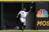 Chicago White Sox left fielder Corey Julks catches a fly ball by Boston Red Sox' Enmanuel Valdez during the first inning of a baseball game in Chicago, Sunday, June 9, 2024. (AP Photo/Nam Y. Huh)
