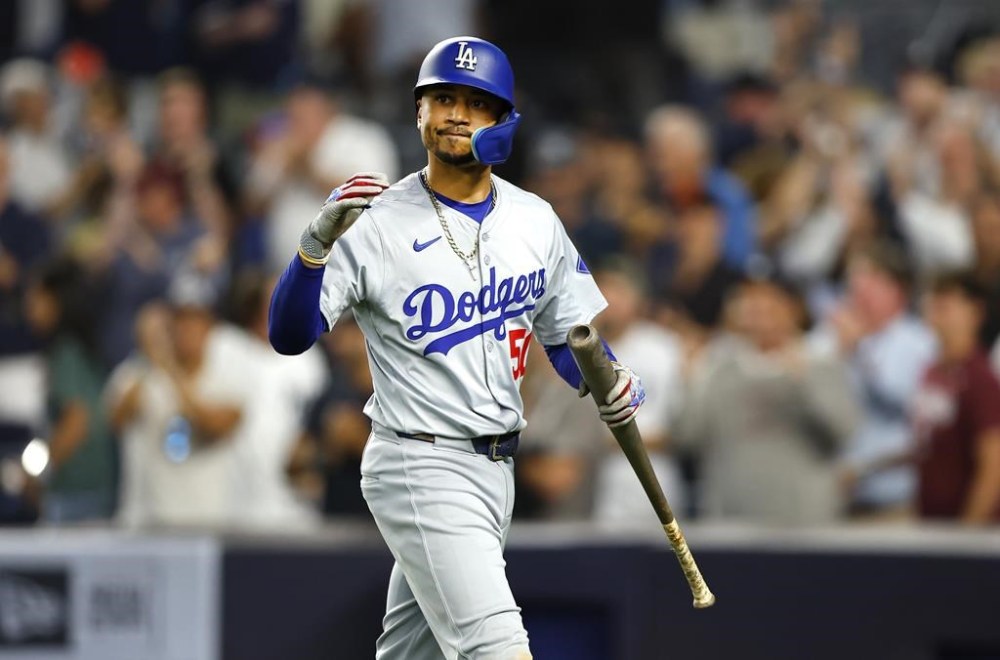 Los Angeles Dodgers shortstop Mookie Betts (50) reacts after striking out during the ninth inning of a baseball game against the New York Yankees, Sunday, June 9, 2024, in New York. The Yankees won 6-4. (AP Photo/Noah K. Murray)