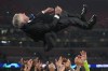 Players throw Real Madrid's head coach Carlo Ancelotti in the air after winning the Champions League final soccer match between Borussia Dortmund and Real Madrid at Wembley stadium in London, Saturday, June 1, 2024. (AP Photo/Kirsty Wigglesworth)