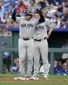New York Yankees' Jose Trevino celebrates on first after hitting an RBI single during the fourth inning of a baseball game against the Kansas City Royals Monday, June 10, 2024, in Kansas City, Mo. (AP Photo/Charlie Riedel)