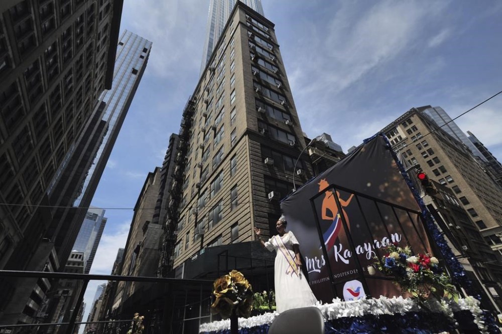People participate in the Philippine Independence Day parade in New York, Sunday, June 2, 2024. Independence Day in the Philippines is observed annually on June 12, commemorating the country's independence from Spain in 1898. (AP Photo/Patrick Sison)