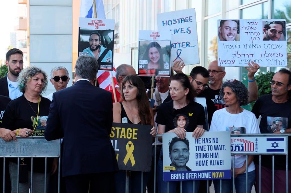 U.S. Secretary of State Antony Blinken meets with families and supporters of Israelis held hostage by Hamas in Gaza, during his visit to Tel Aviv, Israel, Tuesday, June 11, 2024. (Jack Guez, Pool Photo via AP)