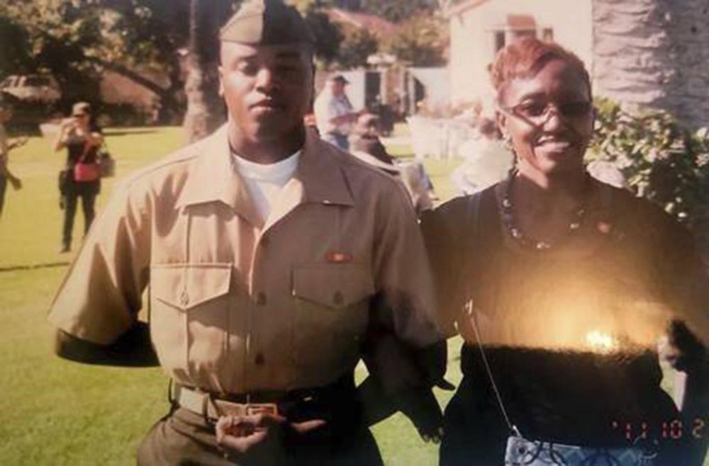 This photo shows Anthony Johnson Jr. and his mother Jacqualyne at the Marine Core graduation in Miramar, San Diego, Calif., during the fall of 2012. Johnson Jr., 31, a former Marine, died April 21, 2024, after fighting with jailers who were conducting a search for contraband during what Sheriff Bill Waybourn called “a routine shakedown” of the jail. (Anthony Johnson Sr. via AP)