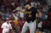 Pittsburgh Pirates relief pitcher David Bednar celebrates after striking out St. Louis Cardinals' Michael Siani during the ninth inning of a baseball game Tuesday, June 11, 2024, in St. Louis. (AP Photo/Jeff Roberson)