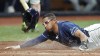 Tampa Bay Rays' Richie Palacios loses his helmet as he scores on a wild pitch by Chicago Cubs' Hayden Wesneski during the seventh inning of a baseball game Tuesday, June 11, 2024, in St. Petersburg, Fla. (AP Photo/Chris O'Meara)