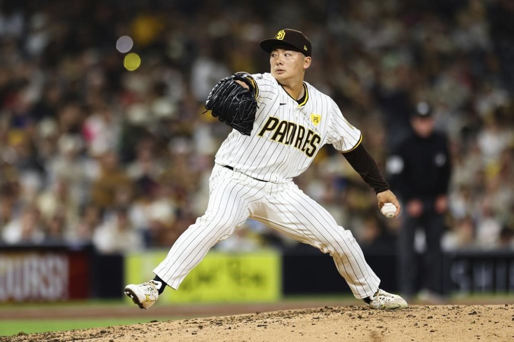 San Diego Padres relief pitcher Yuki Matsui winds up against the Oakland Athletics' batter in the seventh inning of a baseball game Tuesday, June 11, 2024, in San Diego. (AP Photo/Derrick Tuskan)
