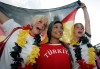 FILE - German and Turkish fans celebrate at the KoelnArena-Dome prior to the soccer EURO 2008 semi-final match between Germany and Turkey in Cologne, Germany, Thursday, June 25, 2008. “In Germany we’re going to be like a host country,” Turkey defender Ozan Kabak, who was born in Turkey but plays his club soccer in Germany, said in a recent interview. “A lot of Turkish people live here, and I think whole stadiums (are) going to be full of Turkish people.