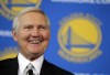 FILE - Jerry West smiles after being introduced as a new member of the Golden State Warriors basketball club's Executive Board, during a news conference in San Francisco, May 24, 2011. Jerry West, who was selected to the Basketball Hall of Fame three times in a legendary career as a player and executive and whose silhouette is considered to be the basis of the NBA logo, died Wednesday morning, June 12, 2024, the Los Angeles Clippers announced. He was 86. (AP Photo/Eric Risberg, File)