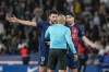 FILE - PSG's Goncalo Ramos, left, and Fabian Ruiz protest to referee Gael Angoula after their first goal was disallowed by VAR decision during the French League One soccer match between Paris Saint-Germain and Clermont at the Parc des Princes stadium in Paris, Saturday, April 6, 2024. Clarity for players and spectators and zero tolerance for serious foul play and dissent. That’s what referees have been tasked with at the European Championship. (AP Photo/Lewis Joly, File)