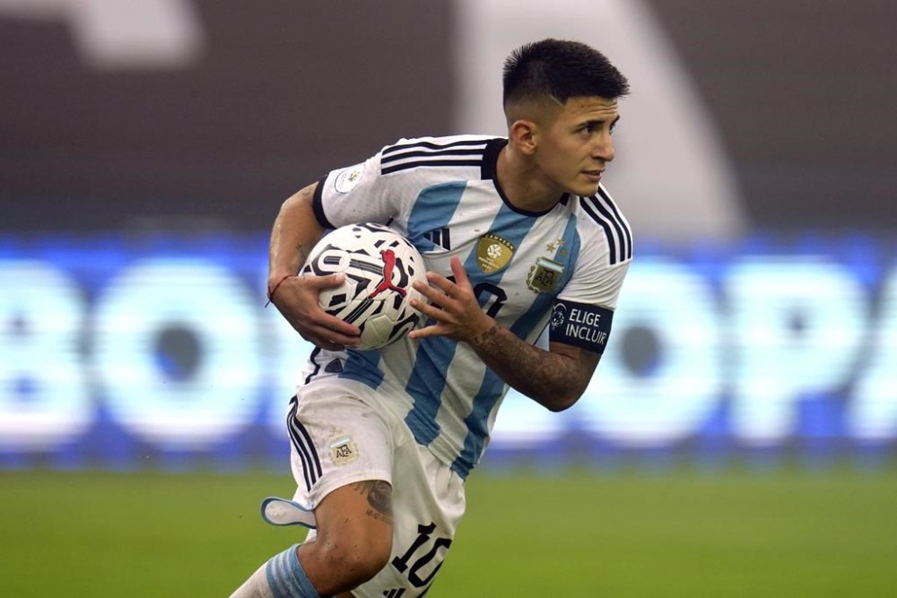 FILE - Argentina's Thiago Almada celebrates after he scored his team's second goal against Paraguay on a pitch blanketed by a light fog, during South America's under-23 pre-Olympic tournament soccer match at Brigido Iriarte stadium in Caracas, Venezuela, on Feb. 8, 2024. (AP Photo/Matias Delacroix, File)