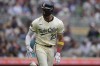 Minnesota Twins' Royce Lewis (23) celebrates after hitting a two-run home run during the sixth inning of a baseball game against the Colorado Rockies,Wednesday, June 12, 2024, in Minneapolis. (AP Photo/Abbie Parr)
