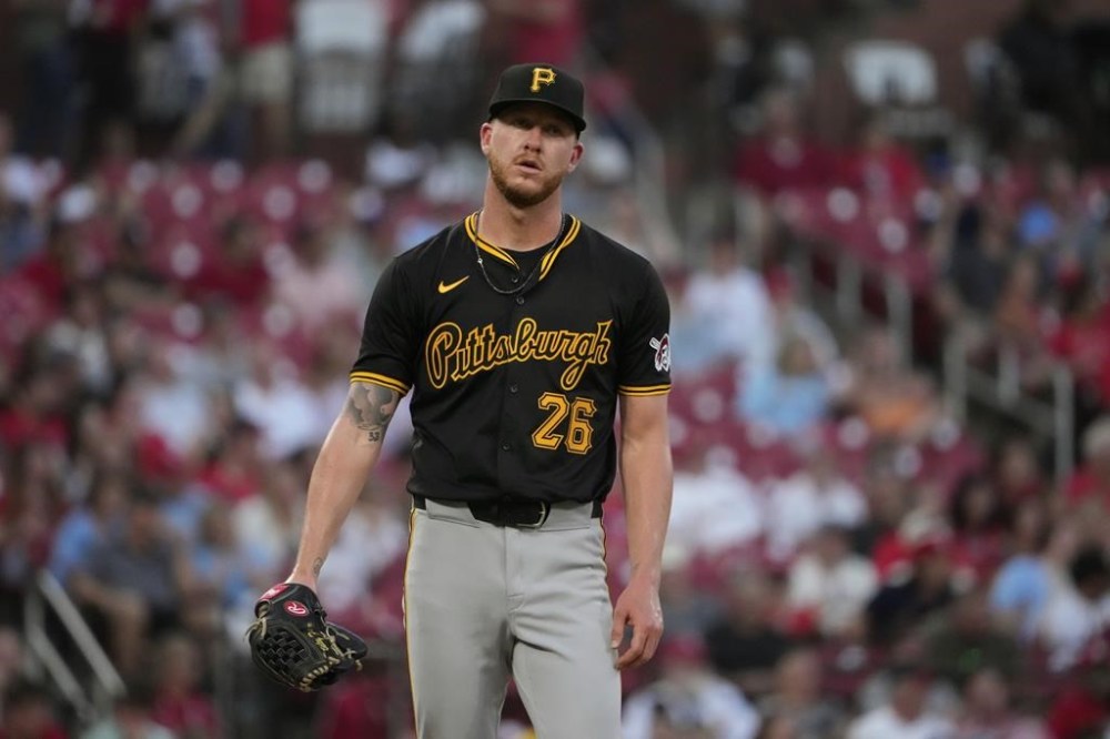 Pittsburgh Pirates starting pitcher Bailey Falter pauses after giving up an RBI single to St. Louis Cardinals' Dylan Carlson during the fourth inning of a baseball game Wednesday, June 12, 2024, in St. Louis. (AP Photo/Jeff Roberson)