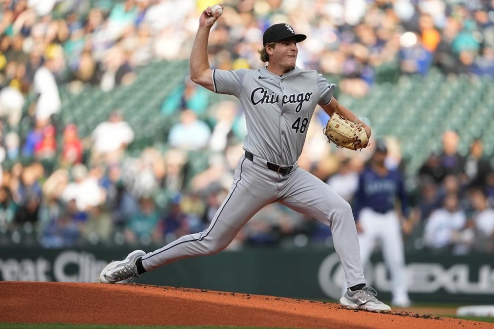 Chicago White Sox starting pitcher Jonathan Cannon throws to a Seattle Mariners batter during the first inning of a baseball game Wednesday, June 12, 2024, in Seattle. (AP Photo/Lindsey Wasson)