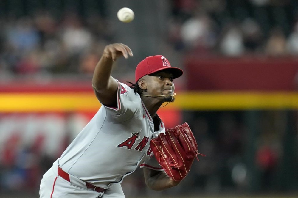 Los Angeles Angels starting pitcher José Soriano throws to an Arizona Diamondbacks batter during the first inning of a baseball game Wednesday, June 12, 2024, in Phoenix. (AP Photo/Ross D. Franklin)