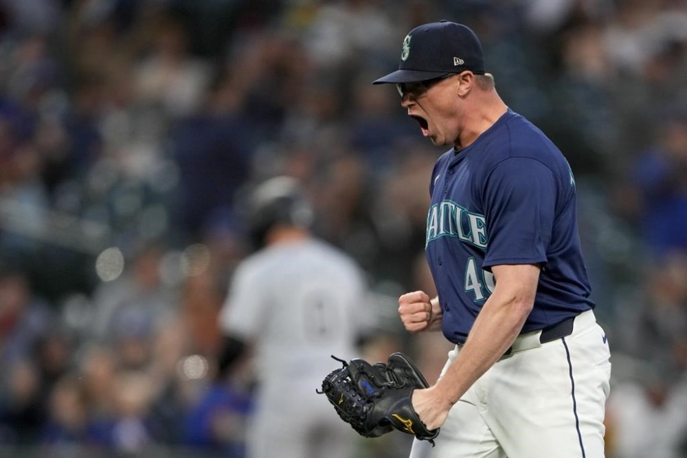 Seattle Mariners relief pitcher Trent Thornton reacts after the top of the 10th inning of the team's baseball game against the Chicago White Sox on Wednesday, June 12, 2024, in Seattle. The Mariners won 2-1 in 10 innings. (AP Photo/Lindsey Wasson)