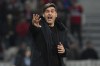 FILE - Lille's head coach Paulo Fonseca gestures during the Europa Conference League round of 16 second leg soccer match between Lille and Sturm Graz, at the Pierre Mauroy stadium in Villeneuve d'Ascq, northern France, Thursday, March 14, 2024. Fonseca was hired as AC Milan’s coach on Thursday, June 13, 2024, and charged with forming a more competitive challenge to city rival and Serie A champion Inter Milan. (AP Photo/Matthieu Mirville, File)