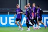 Germany's Thomas Muller, left, Pascal Gross, 2nd left, and goalkeeper Oliver Baumann, center, attend a training session in Freudenstadt, Germany, Wednesday June 12, 2024, ahead of the Euro 2024 European soccer Championships. (Christian Charisius/dpa via AP)