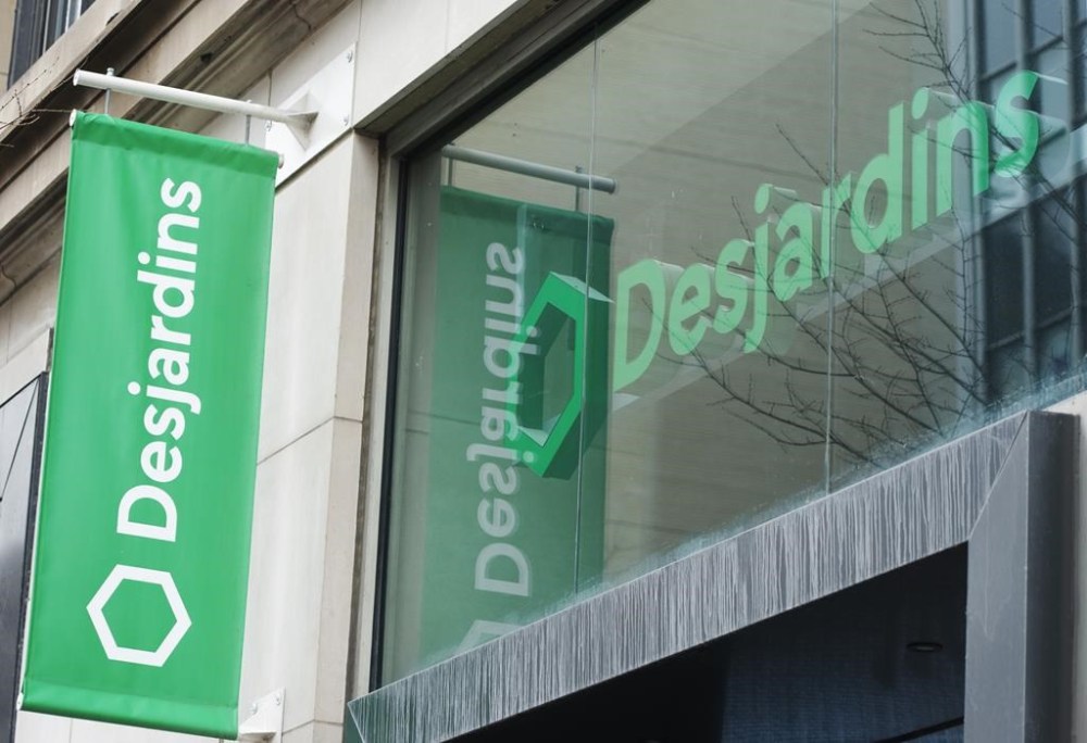 A Caisse Desjardins branch is seen, Wednesday, February 24, 2021 in Montreal. Quebec provincial police have arrested who they say is the principle suspect behind a major data theft and multimillion-dollar fraud involving the co-operative financial group Desjardins. THE CANADIAN PRESS/Ryan Remiorz