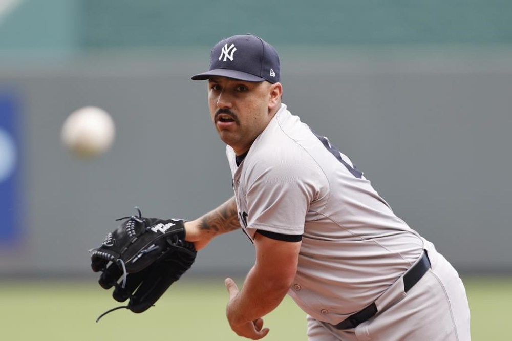 New York Yankees pitcher Nestor Cortes throws during the first inning of a baseball game against the Kansas City Royals in Kansas City, Mo., Thursday, June 13, 2024. (AP Photo/Colin E. Braley)