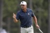 Bryson DeChambeau waves after making a putt on the third hole during the first round of the U.S. Open golf tournament Thursday, June 13, 2024, in Pinehurst, N.C. (AP Photo/George Walker IV)