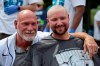 Seattle Mariners catcher Cal Raleigh, right, poses with former Mariners player Jay Buhner on Buhner Buzz Night, Thursday, June 13, 2024, in Seattle. The promotion is based on Buhner's shaved-head style. (AP Photo/John Froschauer)