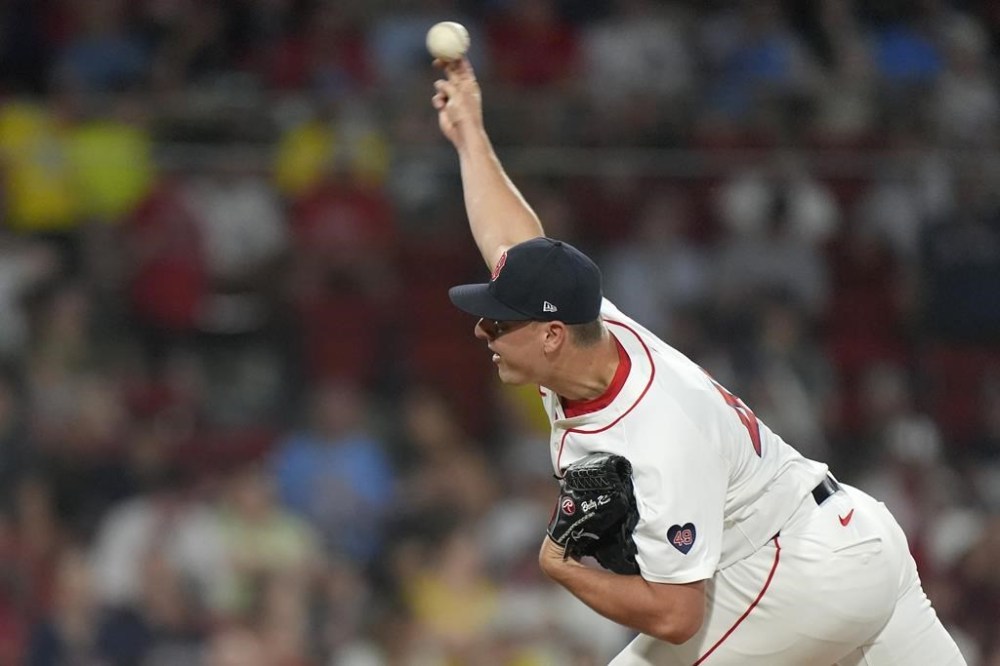Boston Red Sox's Brad Keller delivers a pitch to a Philadelphia Phillies batter during the ninth inning of a baseball game, Thursday, June 13, 2024, in Boston. (AP Photo/Steven Senne)