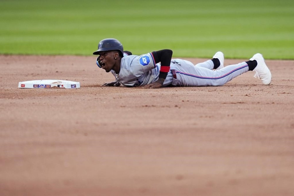 Miami Marlins' Nick Gordon reacts after being caught stealing second base during the second inning of the team's baseball game against the New York Mets, Thursday, June 13, 2024, in New York. (AP Photo/Julia Nikhinson)