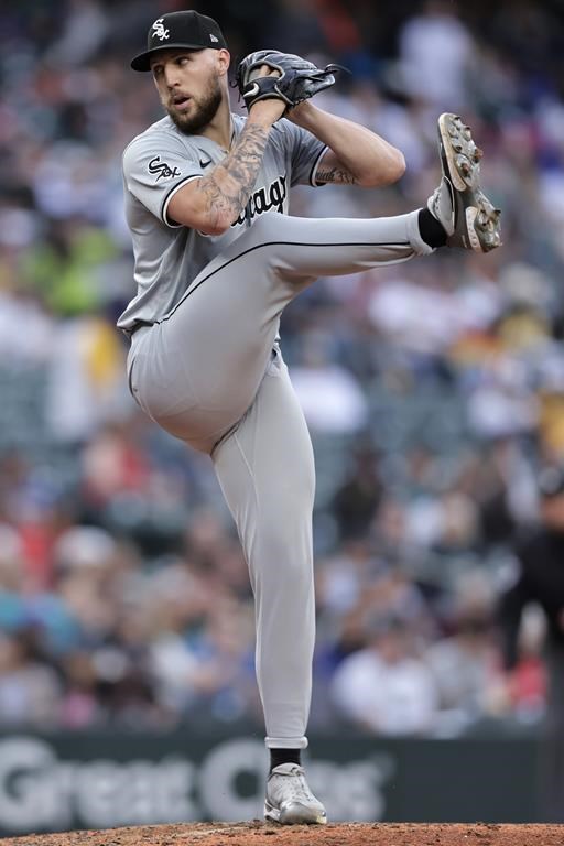 Chicago White Sox pitcher Garrett Crochet winds up to throw to a Seattle Mariners batter during the seventh inning of a baseball game Thursday, June 13, 2024, in Seattle. (AP Photo/John Froschauer)