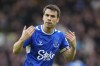 FILE - Everton's Seamus Coleman celebrates at the end of the English Premier League soccer match between Everton and Arsenal at Goodison Park in Liverpool, England, Feb. 4, 2023. Everton captain Seamus Coleman has signed a one-year contract extension to stay at the Merseyside club for what is expected to be the team's final season at Goodison Park, it was announced Friday June 14, 2024. (AP Photo/Jon Super, File)