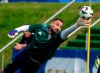 FILE - Italy's goalkeeper Gianluigi Donnarumma in action during the Italian national soccer team's public training session in Iserlohn, Germany, Tuesday, June 11, 2024. Yet both Spalletti and captain Gianluigi Donnarumma warned of Albania being a “banana skin” during their pre-match news conferences Friday in the bowels of Borussia Dortmund’s stadium, where Saturday’s game will take place. (Bernd Thissen/dpa via AP, File)