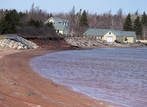 Residents use rock to reinforce the shore line due to rising sea levels and coastal erosion in parts of Lennox Island, P.E.I., on April 25, 2016. THE CANADIAN PRESS/Andrew Vaughan