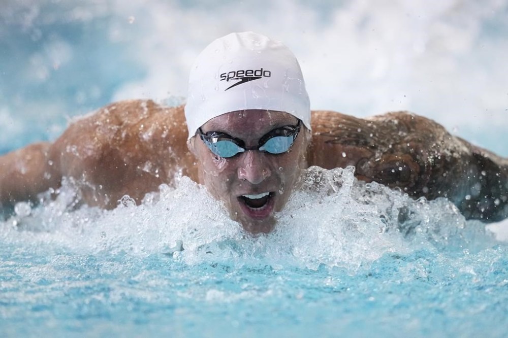 FILE - Caeleb Dressel swims the men's 100 butterfly during the Speedo Atlanta Classic finals Friday, May 12, 2023, in Atlanta. (AP Photo/Brynn Anderson, File)