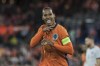 Netherlands' Virgil van Dijk celebrates scoring his side's 2nd goal during the international friendly soccer match between The Netherlands and Iceland at De Kuip stadium in Rotterdam, Netherlands, Monday, June 10, 2024. (AP Photo/Patrick Post)